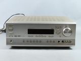 an image of a close up of a stereo receiver on a table