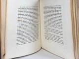 an open book that is sitting on a table