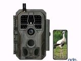 an image of a bird is standing next to a cell phone