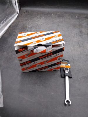 a box of pizza and a wrenet on the floor