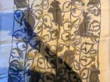 gros plan d'un morceau de tissu sur lequel est dessiné un motif