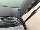 a car with a broken windshield and a broken windshield