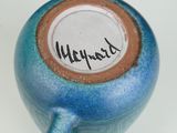 a close up of a coffee cup with a name on it