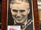 a picture of a smiling man in a picture frame