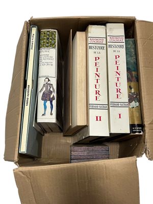 many books in a cardboard box on a white background