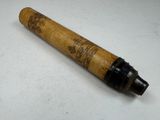 an old pen that is sitting on top of a table