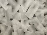 a close up of a pile of toilet paper on a table