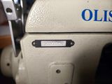a close up of a sewing machine with the name of the machine