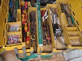 a yellow tool box filled with tools on the floor