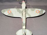 a model of a fighter plane on a gray surface