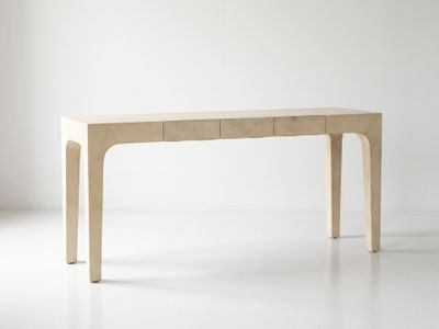 a wooden table with two drawers on top of it