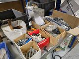 many boxes of assorted items sitting on a table