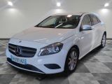 the mercedes b - class is parked on a checkered floor