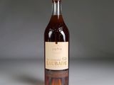 a bottle of wine that is sitting on a table