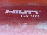 a close up of a red box with a sticker that says hitt gx 100