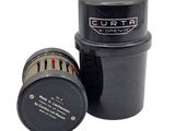 a close up of a black cup with a black lid