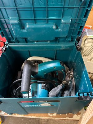 a blue tool box with tools inside of it
