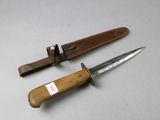 two knives that are sitting next to each other on a table