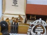 a box of jewelry that is sitting on a table