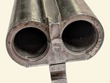 a close up of a gun on a white background