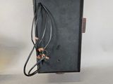 a black box with wires and wires on it