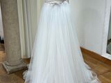 a dress on a mannequin stand in a room