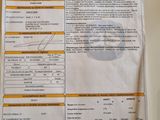 une image représentant une feuille de papier sur laquelle figure la photo d'une personne