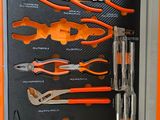 many different tools in this box on the table