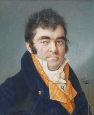 portrait of a man in a blue coat and yellow shirt