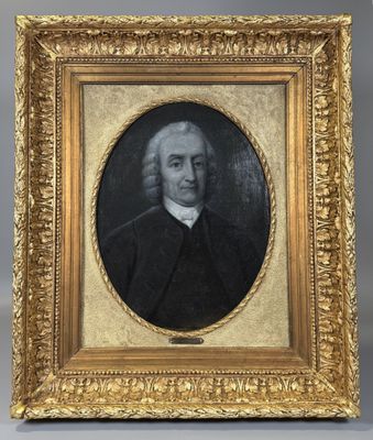 le portrait d'un homme dans un cadre doré