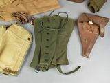 many different types of leather items laid out on a table