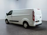 a white van that is parked in a room