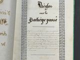 an open book with writing on it sitting on top of a table