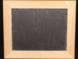 a close up of a wooden frame with a blackboard in it