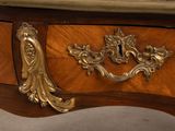 a close up of a table with a clock on top of it