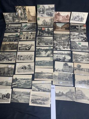 many old postcards of different types and sizes are on a table