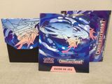 pokemon trading card game box with two cards and a card holder