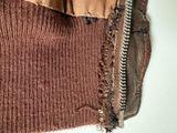 a brown sweater with a zipper on the side