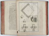 an open book with a drawing of a square and a square