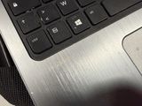 a close up of a laptop keyboard on a table