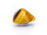 a close up of a tiger eye stone on a white surface