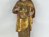 an image of a statue of jesus holding a cross on a white background