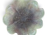 une photo d'un plat en verre en forme de fleur