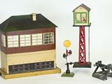 a small model of a train station with a clock tower