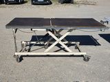 a table that is sitting in the middle of a parking lot
