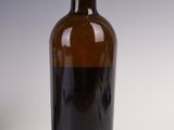 a bottle of wine that is sitting on a table