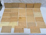 an image of a pile of old papers sitting on top of a table