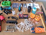 a table with many tools on it that are sitting on the table