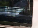 a close up of a laptop screen with a blurry image on it