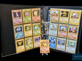 a black folder with a bunch of cards inside of it